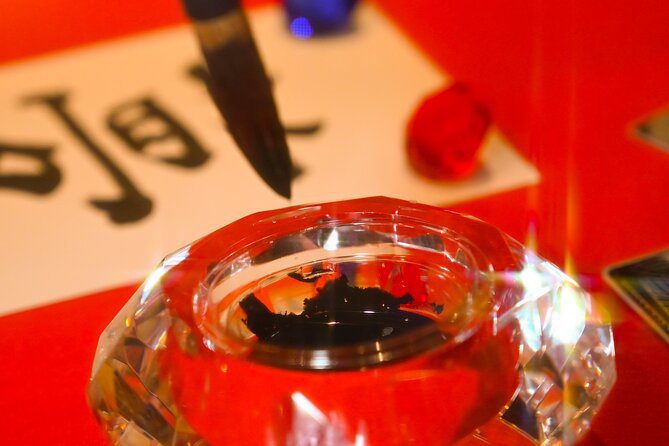 brush dipping ink shodocafe7557 Brush tip dipping into inkwell at Shodocafe7557 in Roppongi