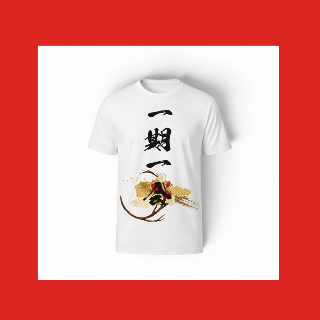 White T-shirt featuring the handwritten Japanese phrase “一期一会” with an elegant gold, red, and floral design