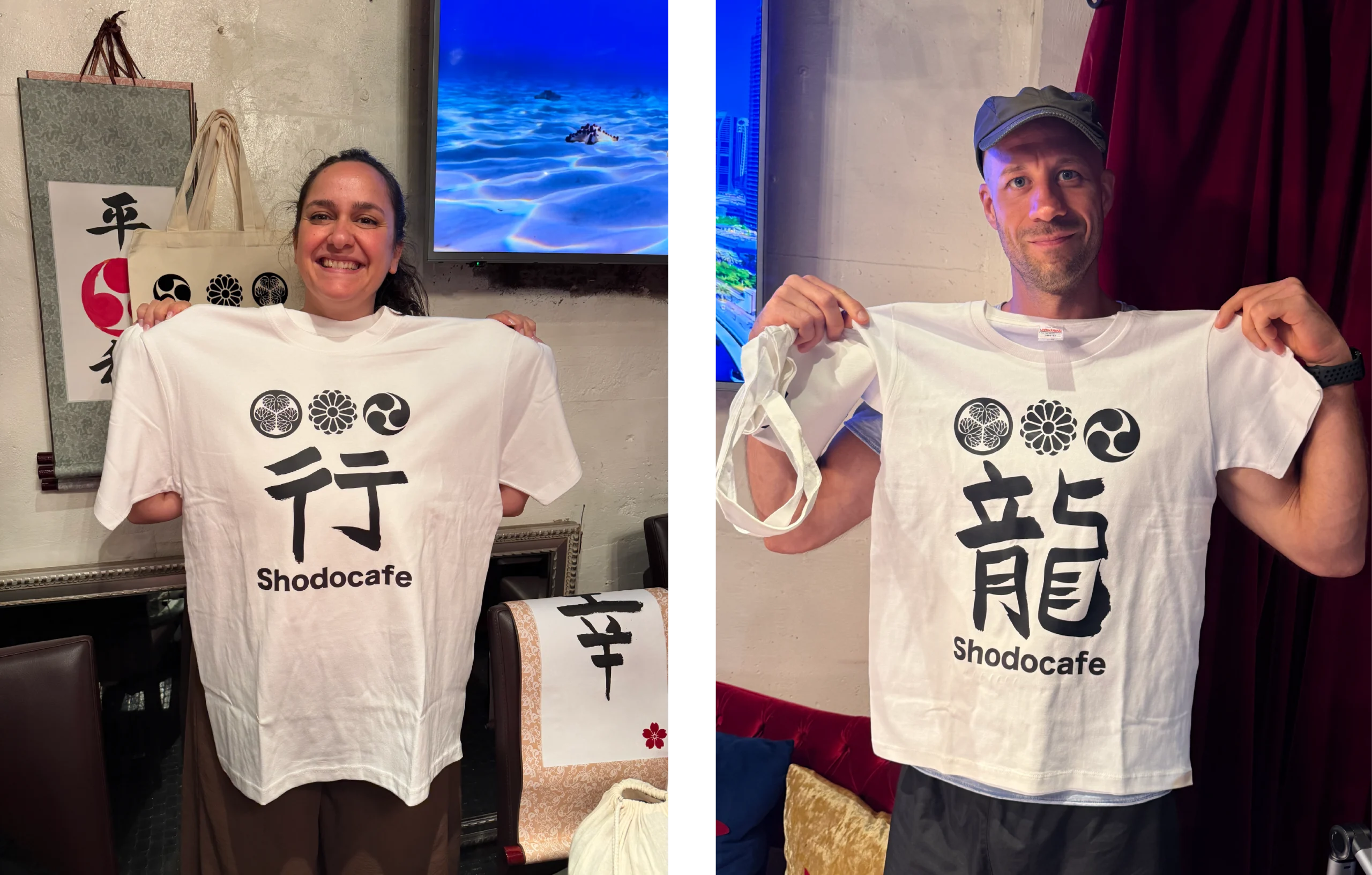 custom kanji calligraphy tshirts group tokyo scaled Guests holding custom Kanji calligraphy T-shirts featuring 行 and 龍 during a group experience at Shodocafe7557 in Roppongi, Tokyo.